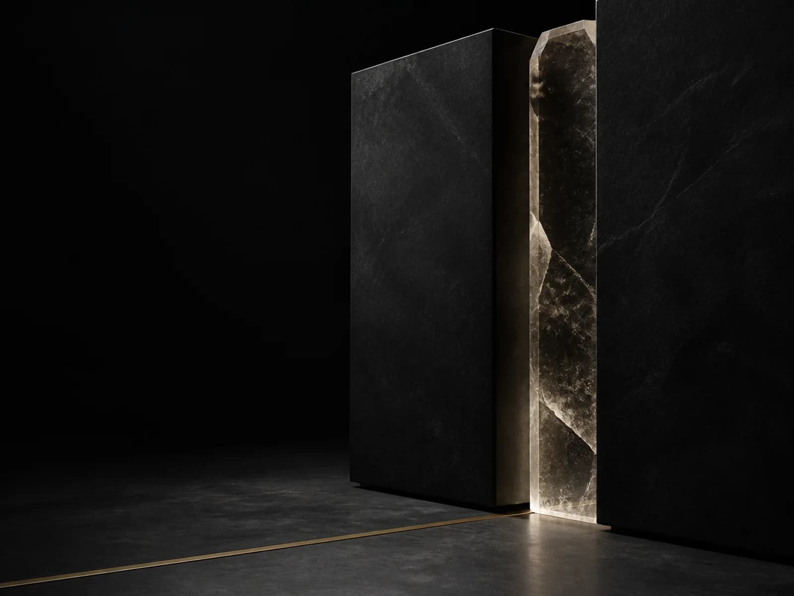 A near-black architectural threshold opened by a narrow, restrained line of warm light.